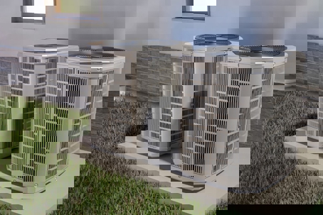 Two modern air conditioning units