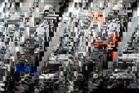 A technician in a hard hat