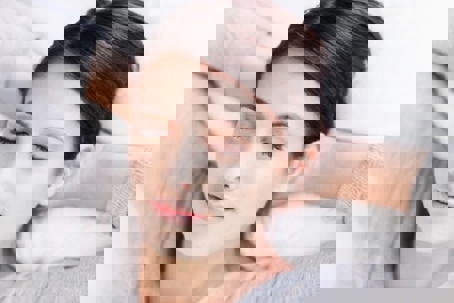 A woman rests peacefully